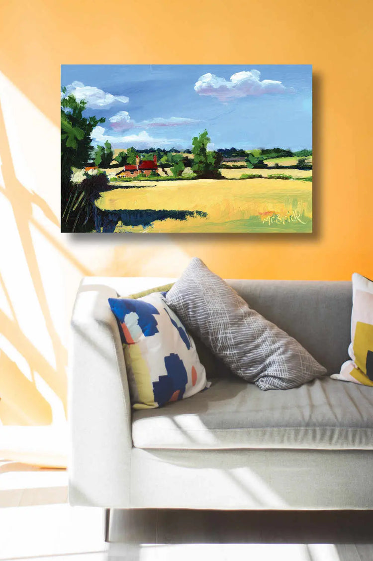 Canvas print reproduction displayed on a bright yellow wall over a neutral grey sofa.
