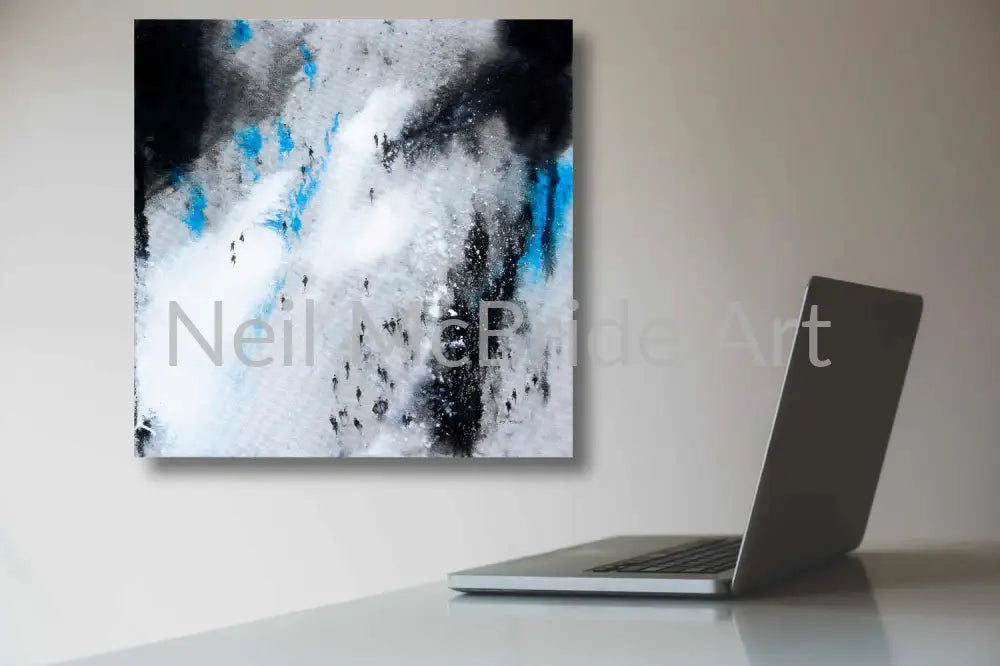 Original blue and grey landscape painting displayed on a wall with a laptop in the foreground. Painted by Yorkshire landscape artist Neil McBride. © Neil McBride 2023