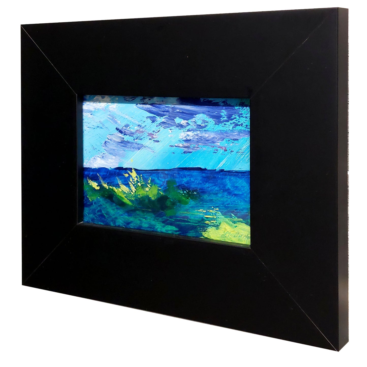 Framed moorland artwork with blue and green tones on a white background