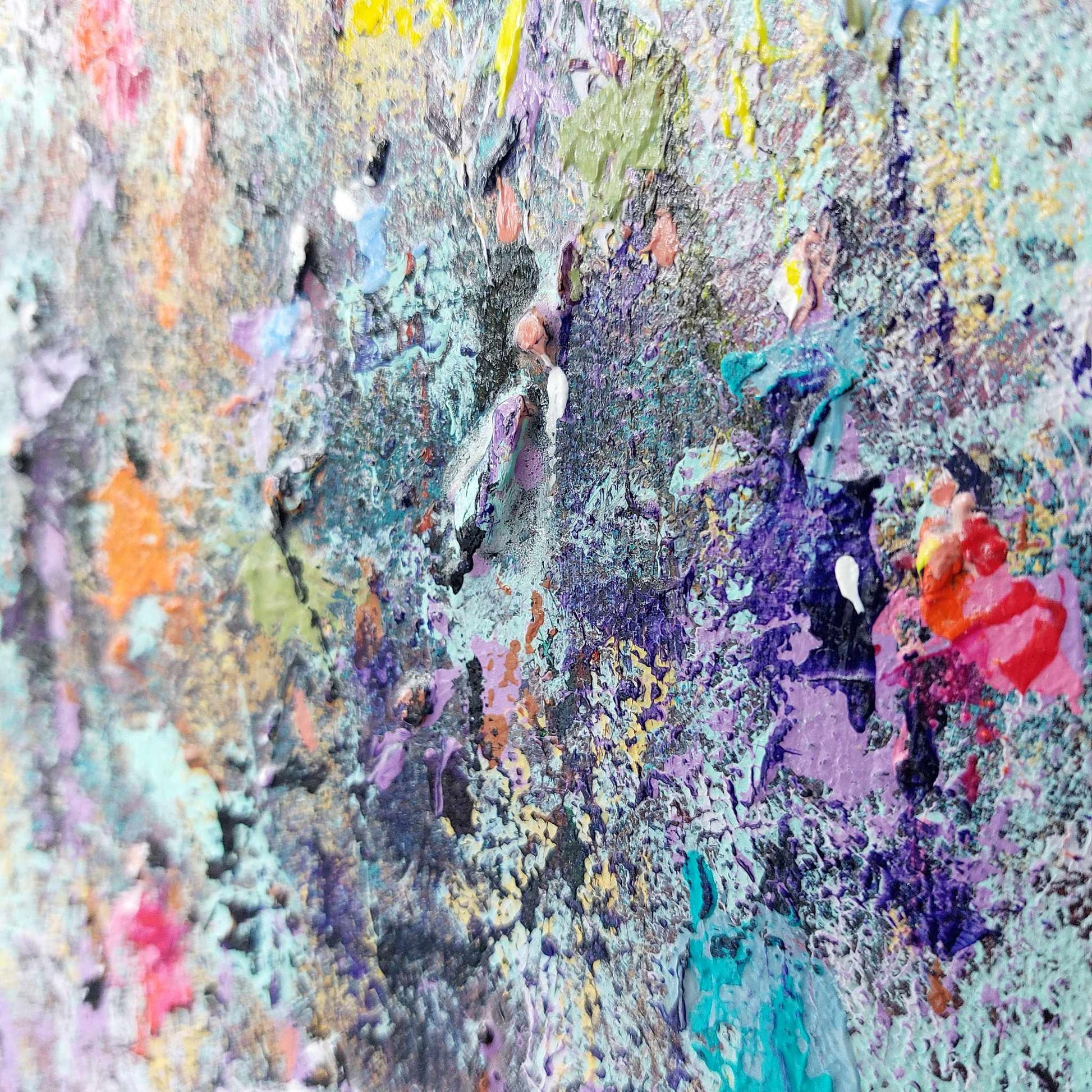 Tactile abstract art detail with multicoloured textures and patterns giving the impression of figures emerging from the background. © Neil McBride artist 2026